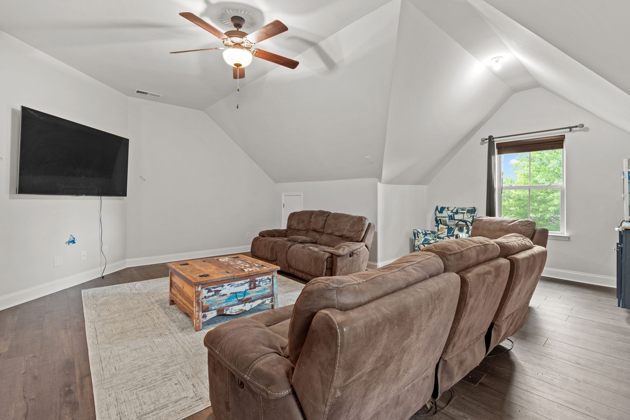 2957 Stewart Campbell Pointe Spring Hill, TN 37174 - Photo 39 of 53 a living room with furniture and a flat screen tv