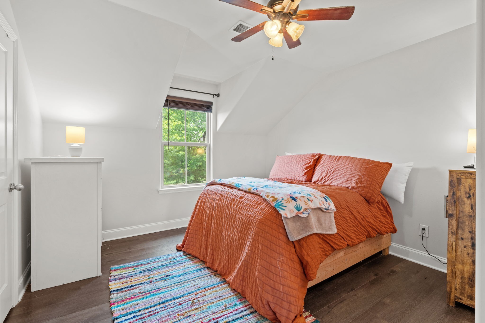 2957 Stewart Campbell Pointe Spring Hill, TN 37174 - Photo 42 of 53 a bedroom with a bed and wooden floor