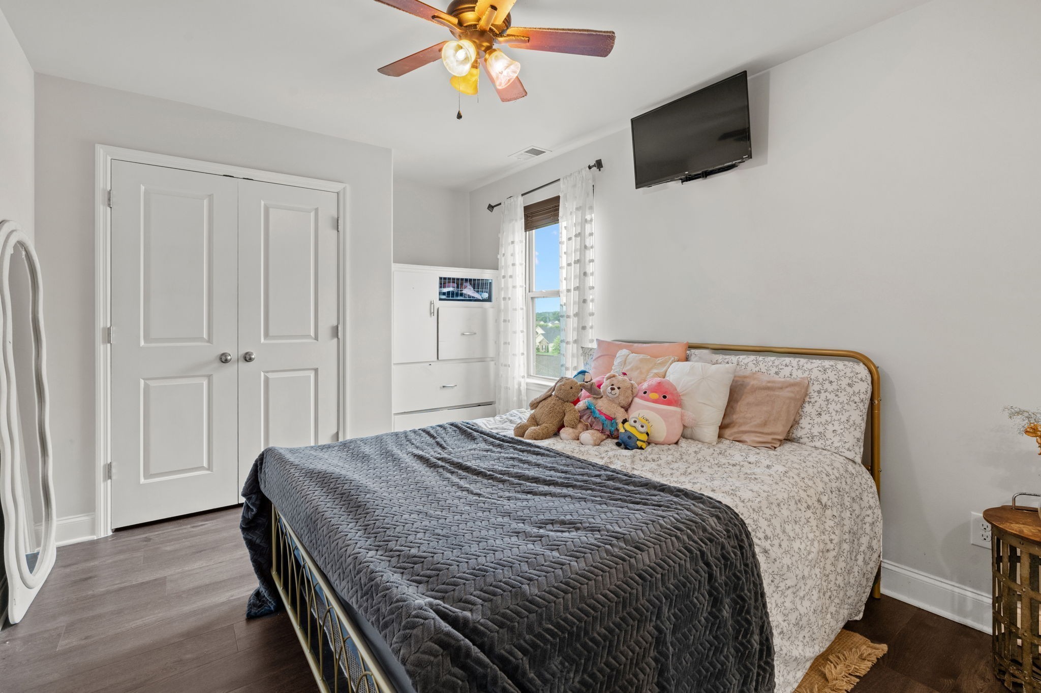 2957 Stewart Campbell Pointe Spring Hill, TN 37174 - Photo 48 of 53 a bedroom with a bed and a chandelier