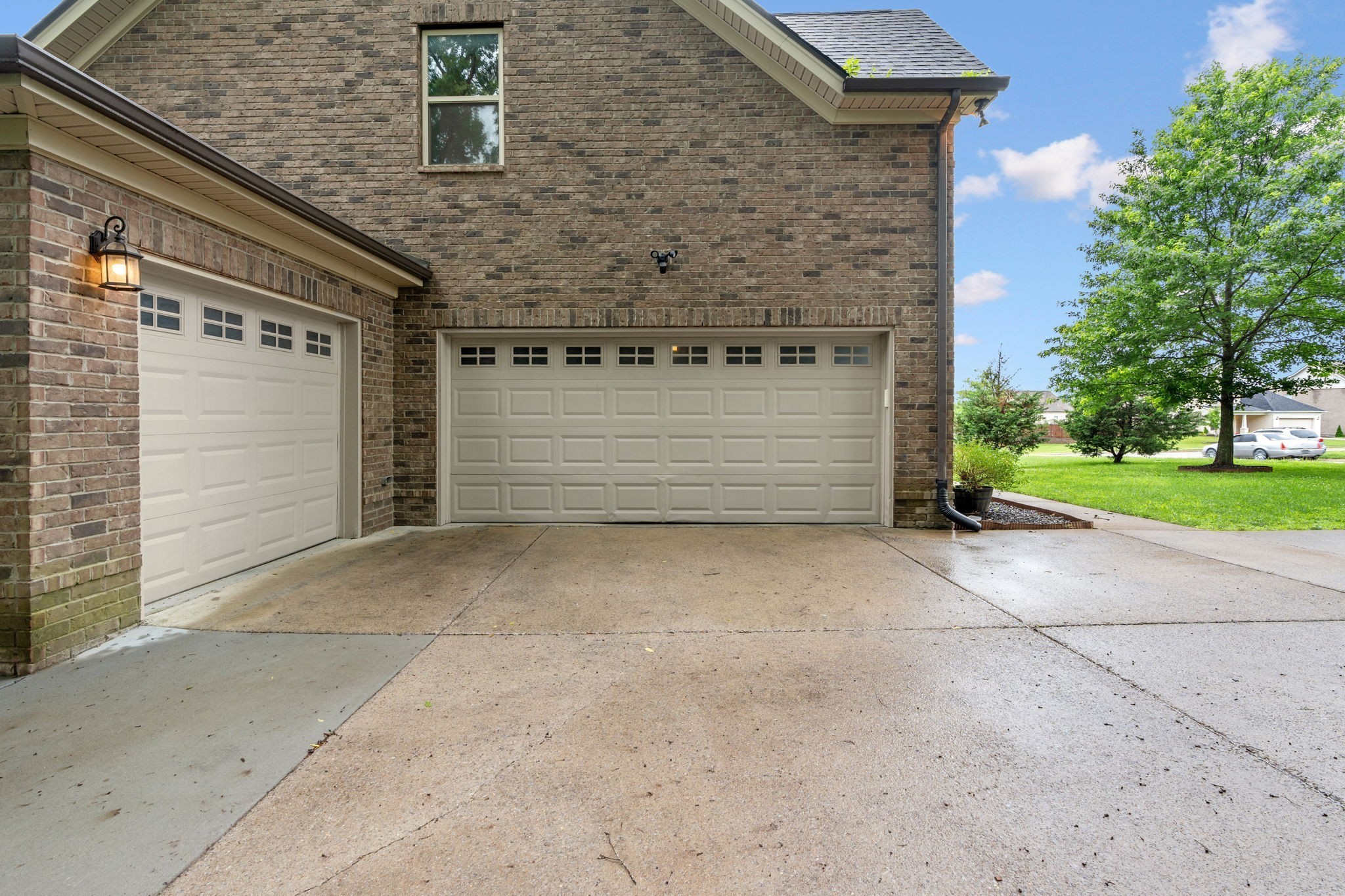 2957 Stewart Campbell Pointe Spring Hill, TN 37174 - Photo 6 of 53 a front view of a house with a yard