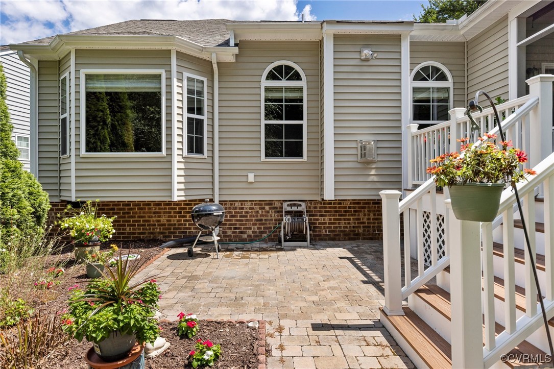 14619 Forest Row Trail Midlothian, VA 23112 - Photo 34 of 43 a front view of a house with a garden