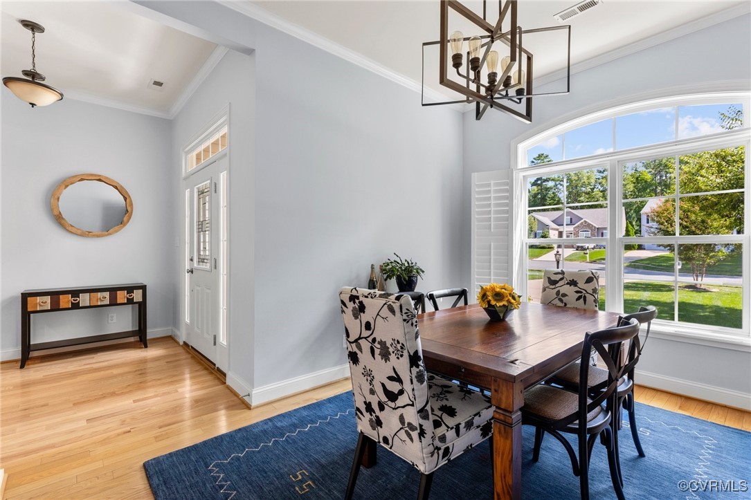 14619 Forest Row Trail Midlothian, VA 23112 - Photo 7 of 43 a view of a dining room with furniture window and outside view