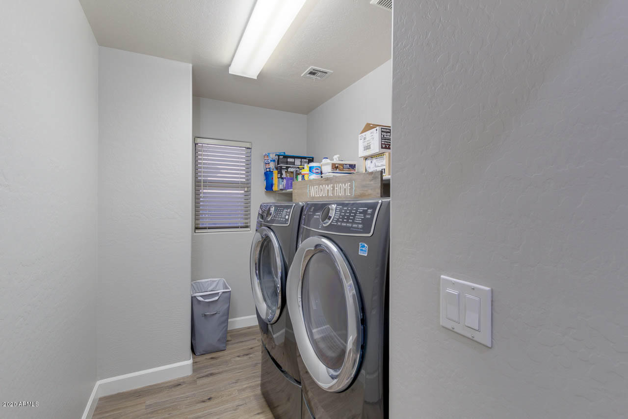 3315 East Los Altos Road Gilbert, AZ 85297 - Photo 48 of 66 a utility room with dryer and washer