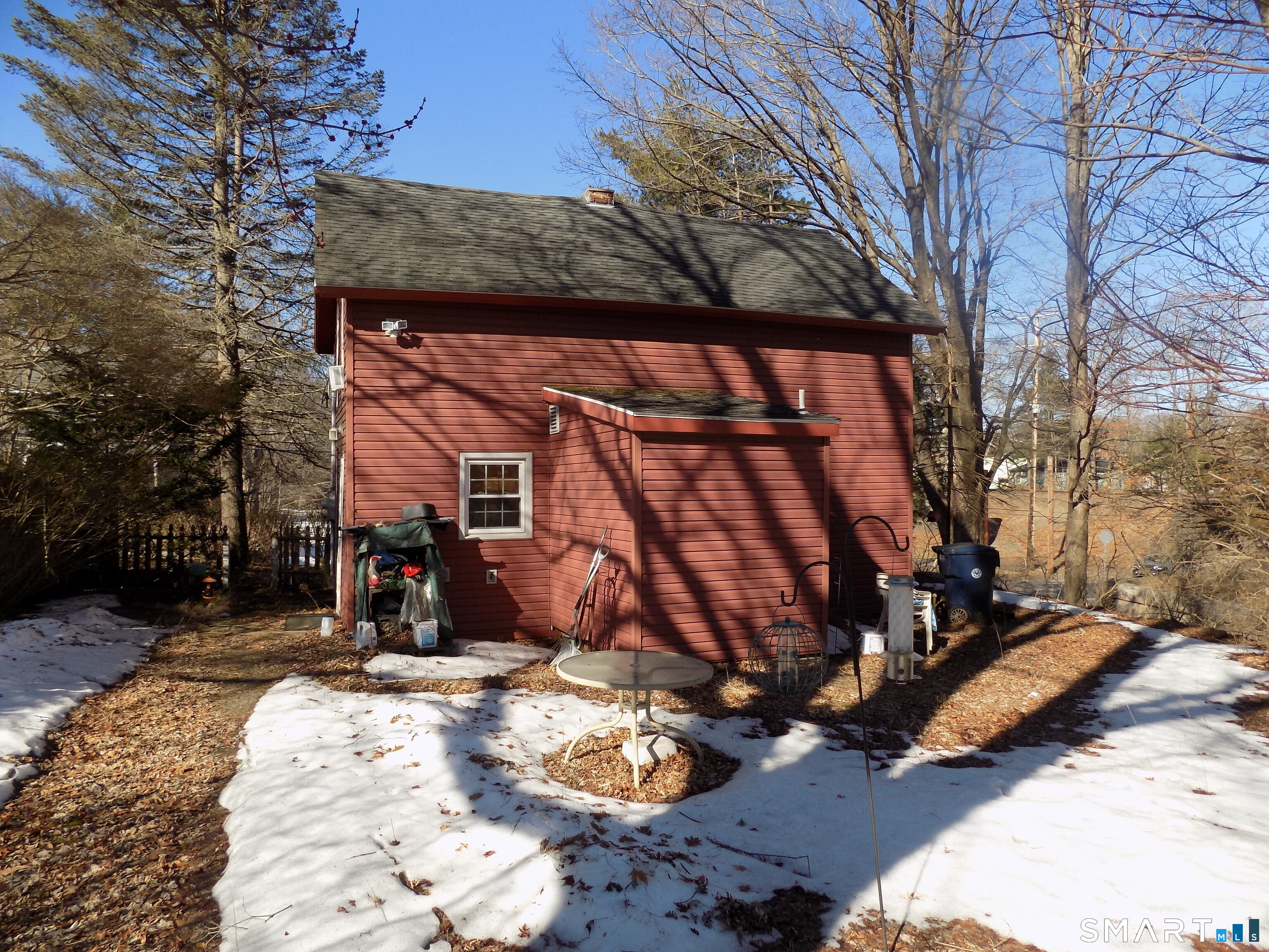 149 South Riverside Avenue Plymouth, CT 06781 - Photo 12 of 12 a view of a backyard with a large tree