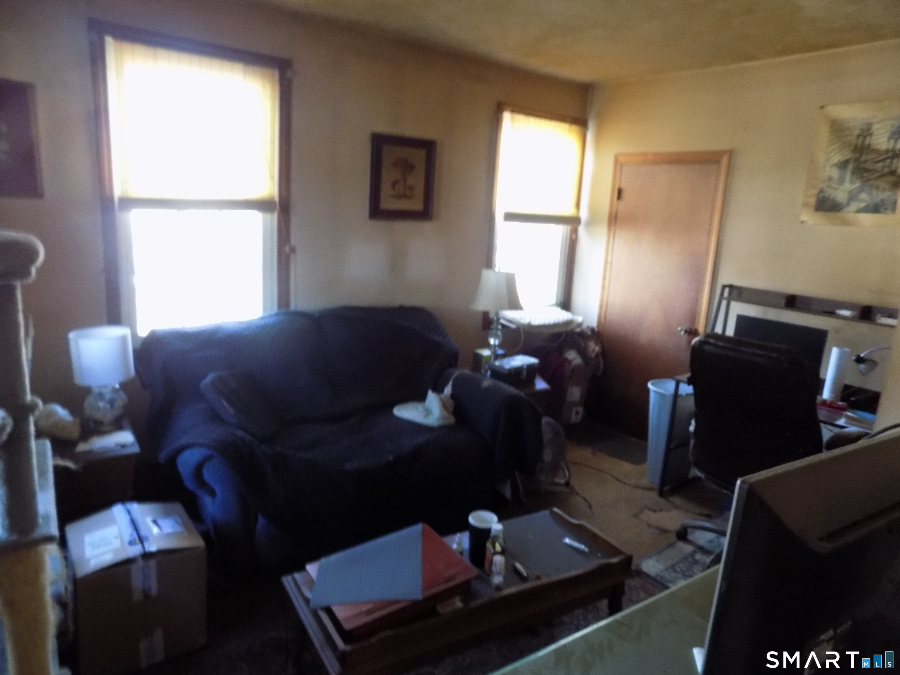 149 South Riverside Avenue Plymouth, CT 06781 - Photo 2 of 12 a living room with furniture and a window