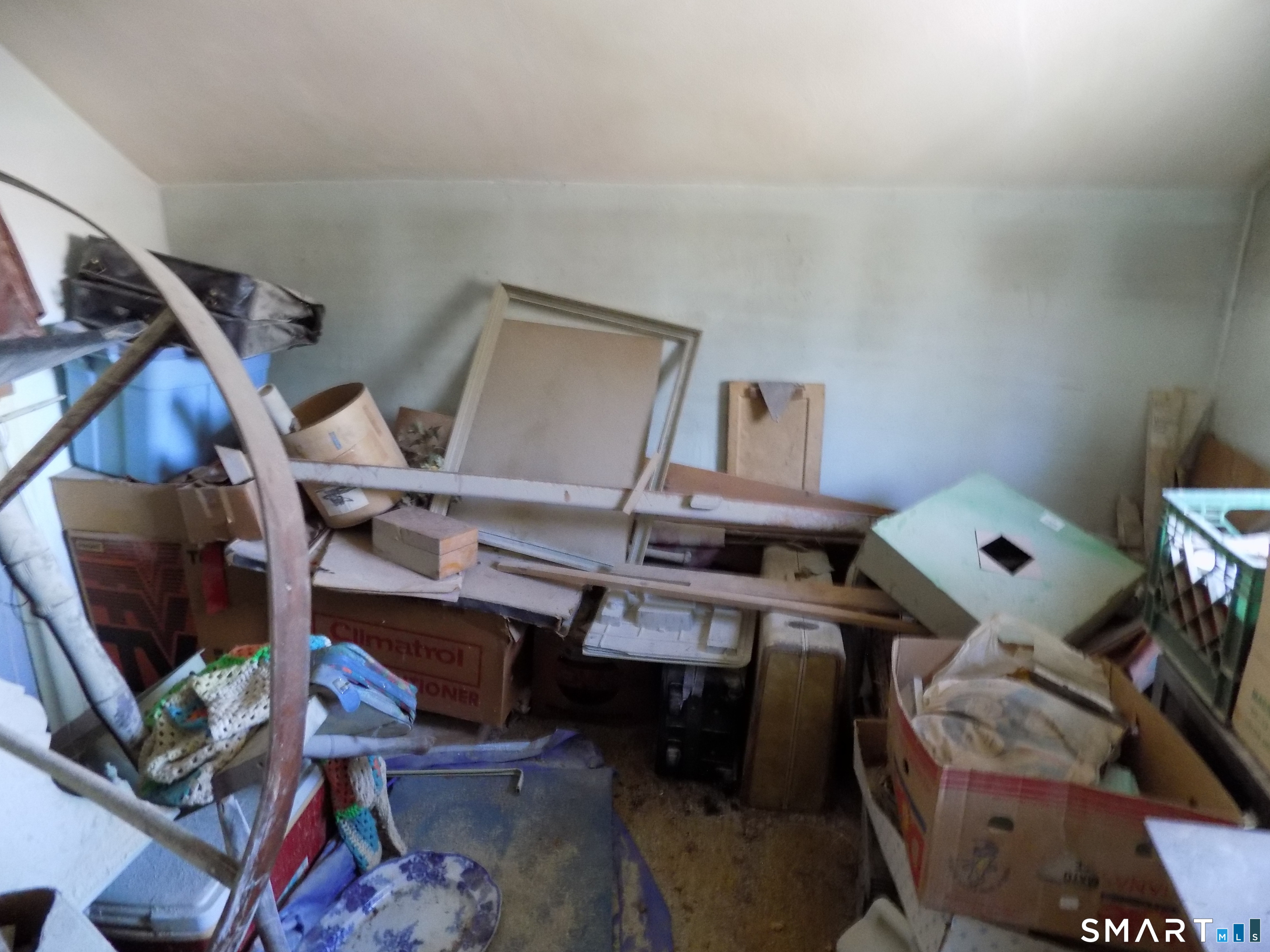 149 South Riverside Avenue Plymouth, CT 06781 - Photo 10 of 12 a bed room with a bed and a computer on a desk