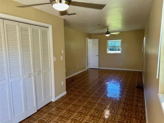 a bathroom with a shower a toilet and sink