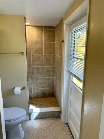 a view of kitchen and wooden floor