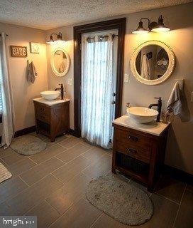 3161 Apple Pie Ridge Road Winchester, VA 22603 - Photo 14 of 39 Master suite bathroom- 2 sinks, door out to deck