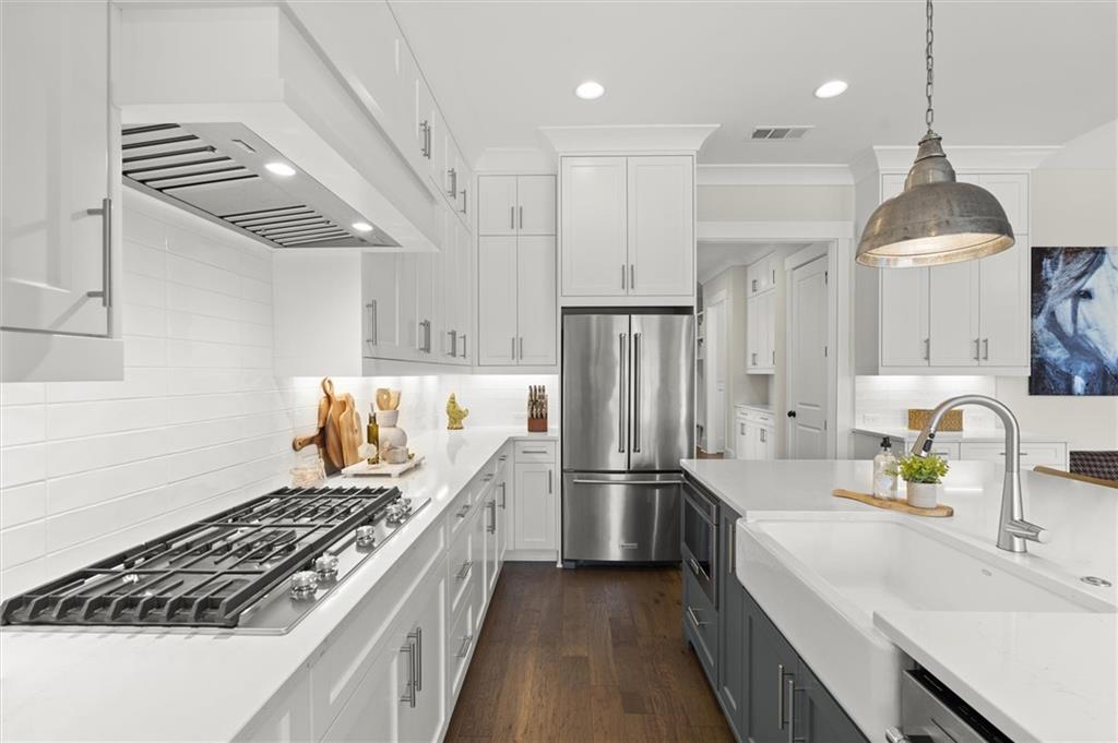 3809 Cochran Lake Road Marietta, GA 30062 - Photo 14 of 40 a kitchen with refrigerator and countertop