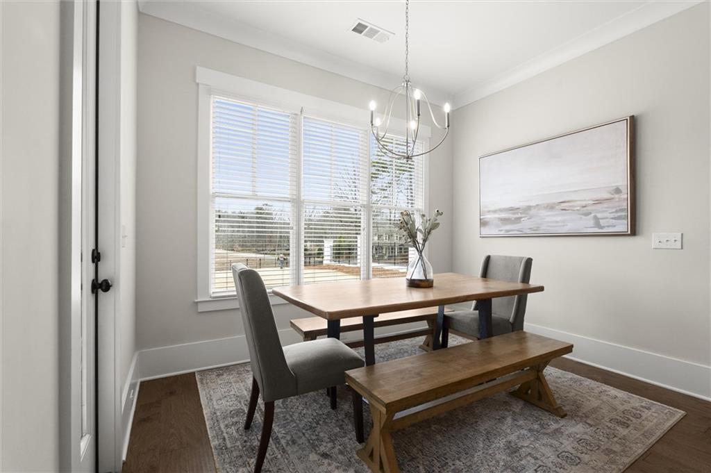 3809 Cochran Lake Road Marietta, GA 30062 - Photo 15 of 40 a view of a dining room with furniture window and outside view