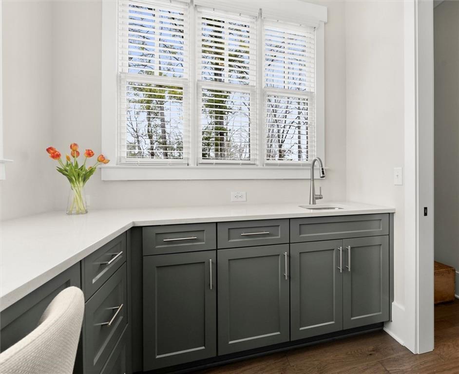 3809 Cochran Lake Road Marietta, GA 30062 - Photo 18 of 40 a sink with a window and cabinets