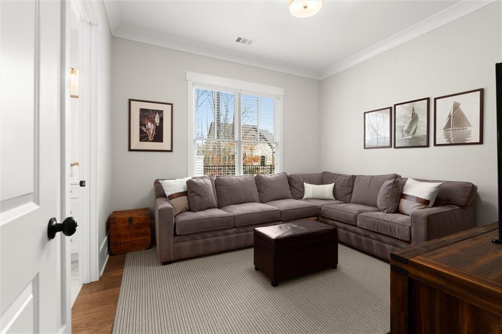 3809 Cochran Lake Road Marietta, GA 30062 - Photo 25 of 40 a living room with furniture and a window