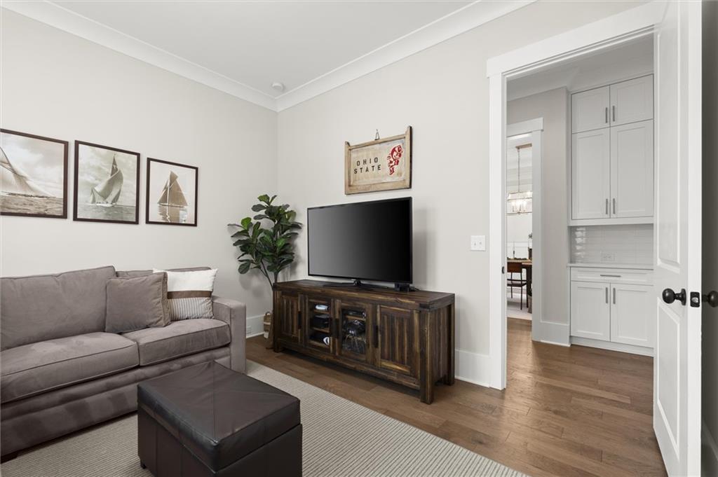 3809 Cochran Lake Road Marietta, GA 30062 - Photo 26 of 40 a living room with furniture and a flat screen tv