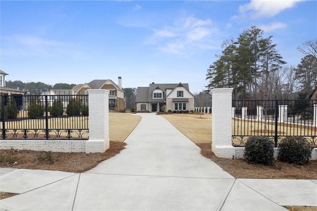 3809 Cochran Lake Road Marietta, GA 30062 - Photo 3 of 40 a view of a building with a outdoor space