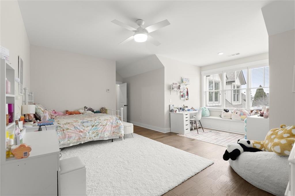 3809 Cochran Lake Road Marietta, GA 30062 - Photo 31 of 40 a bedroom with furniture and a large mirror