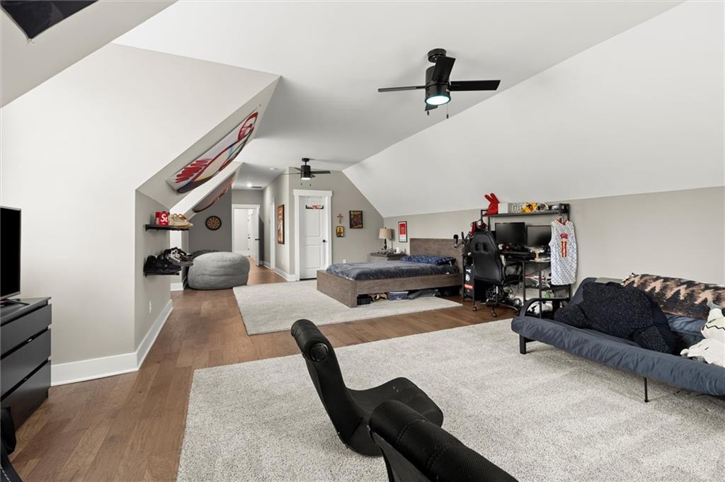 3809 Cochran Lake Road Marietta, GA 30062 - Photo 34 of 40 a living room with furniture and a flat screen tv