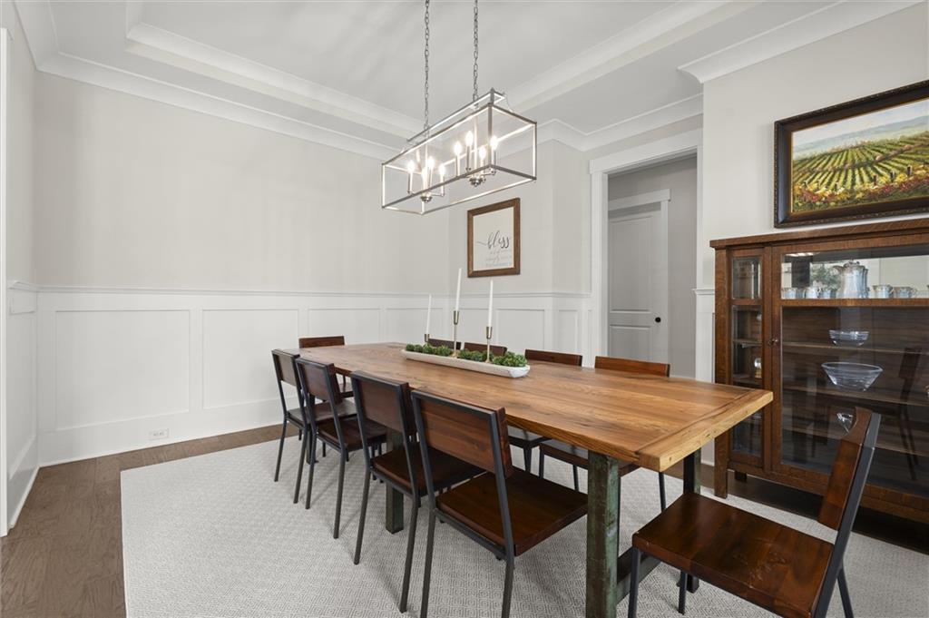 3809 Cochran Lake Road Marietta, GA 30062 - Photo 7 of 40 a view of a dining room with furniture and wooden floor