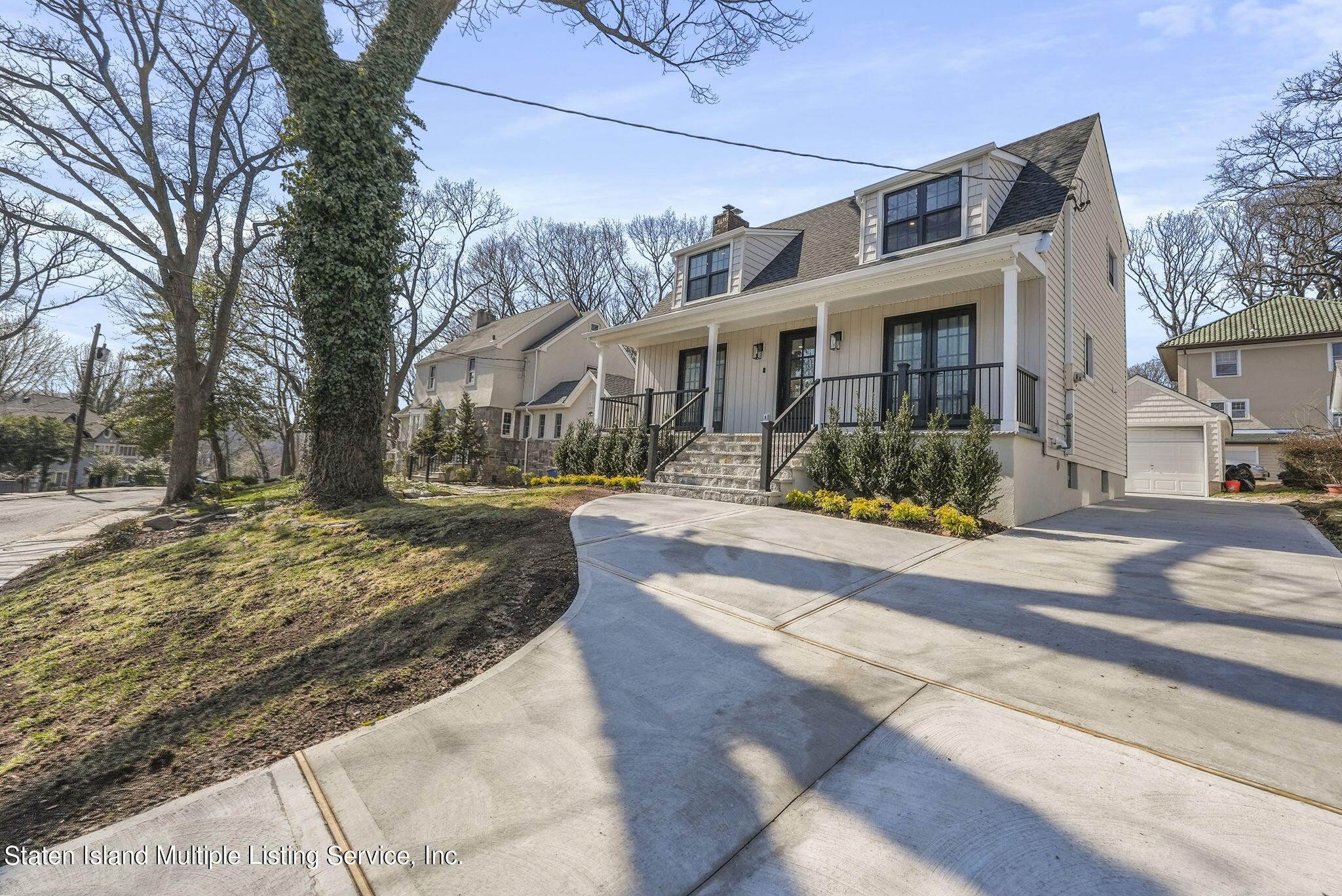 8 Starlight Road Staten Island, NY 10301 - Photo 45 of 56 Front Side Angle Driveway