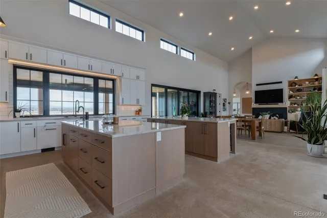 a kitchen with cabinets and furniture