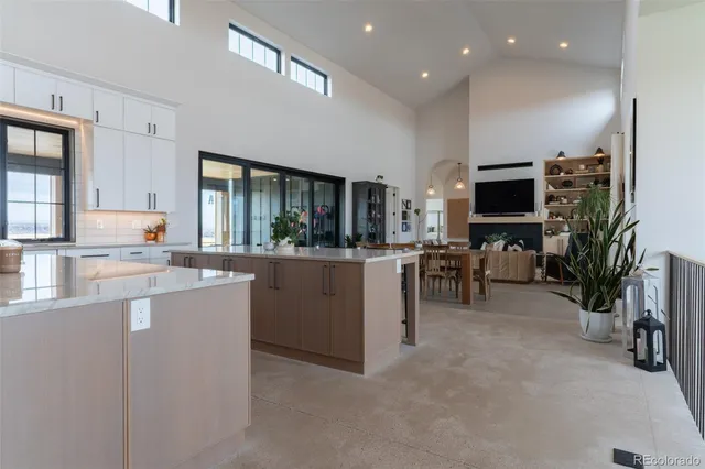 a kitchen with sink cabinets and outdoor living space