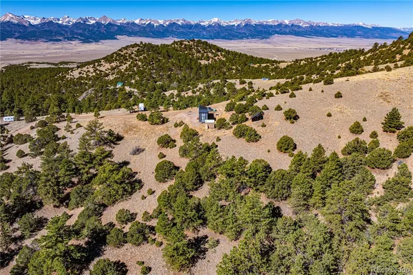 a view of a terrace with a forest