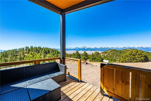 a view of a balcony with lake view and a ocean view