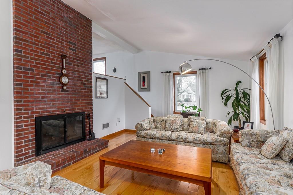 2 Ryder Lane Lexington, MA 02421 - Photo 3 of 14 a living room with furniture and a fireplace