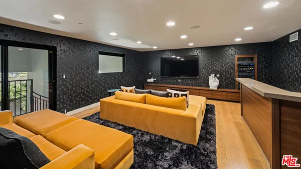 a bedroom with a bed and a fireplace