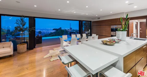 a room with lots of table and chairs