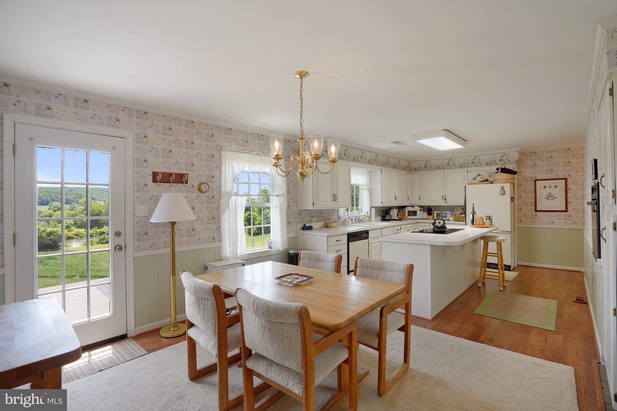 8362 Meadows Road Warrenton, VA 20186 - Photo 14 of 73 Open bright kitchen with a view of your pond.