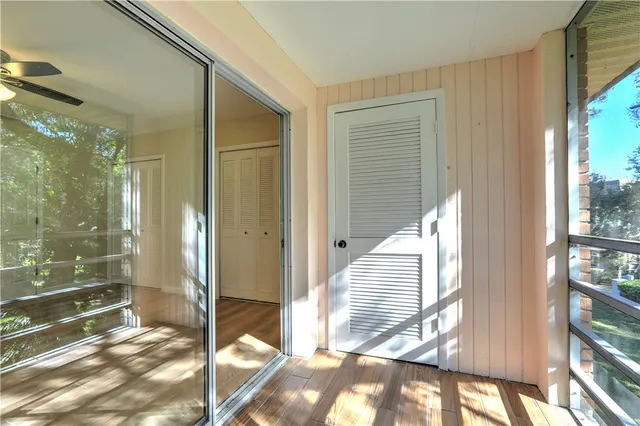 a view of a bathroom with a glass door