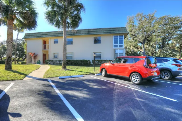 a view of yard with car parked