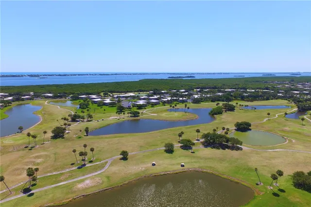 a view of an ocean and city