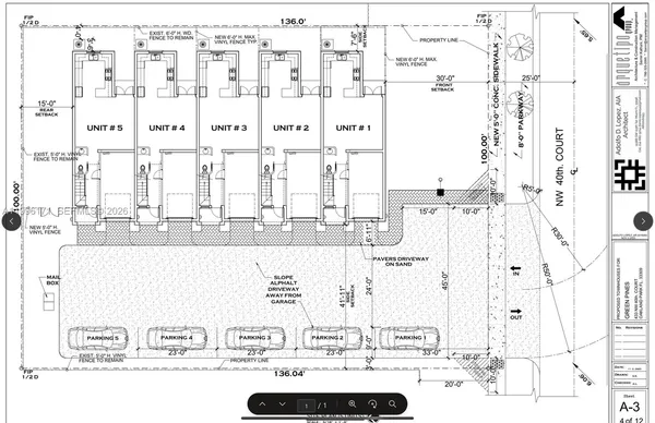 an aerial view of a house with a garden and mountain view in back