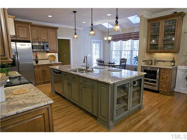 9321 Stone Mountain Road Raleigh, NC 27613 - Photo 3 of 25 Enormous gormet kitchen with granite countertops and custom cabinets. Kitchen