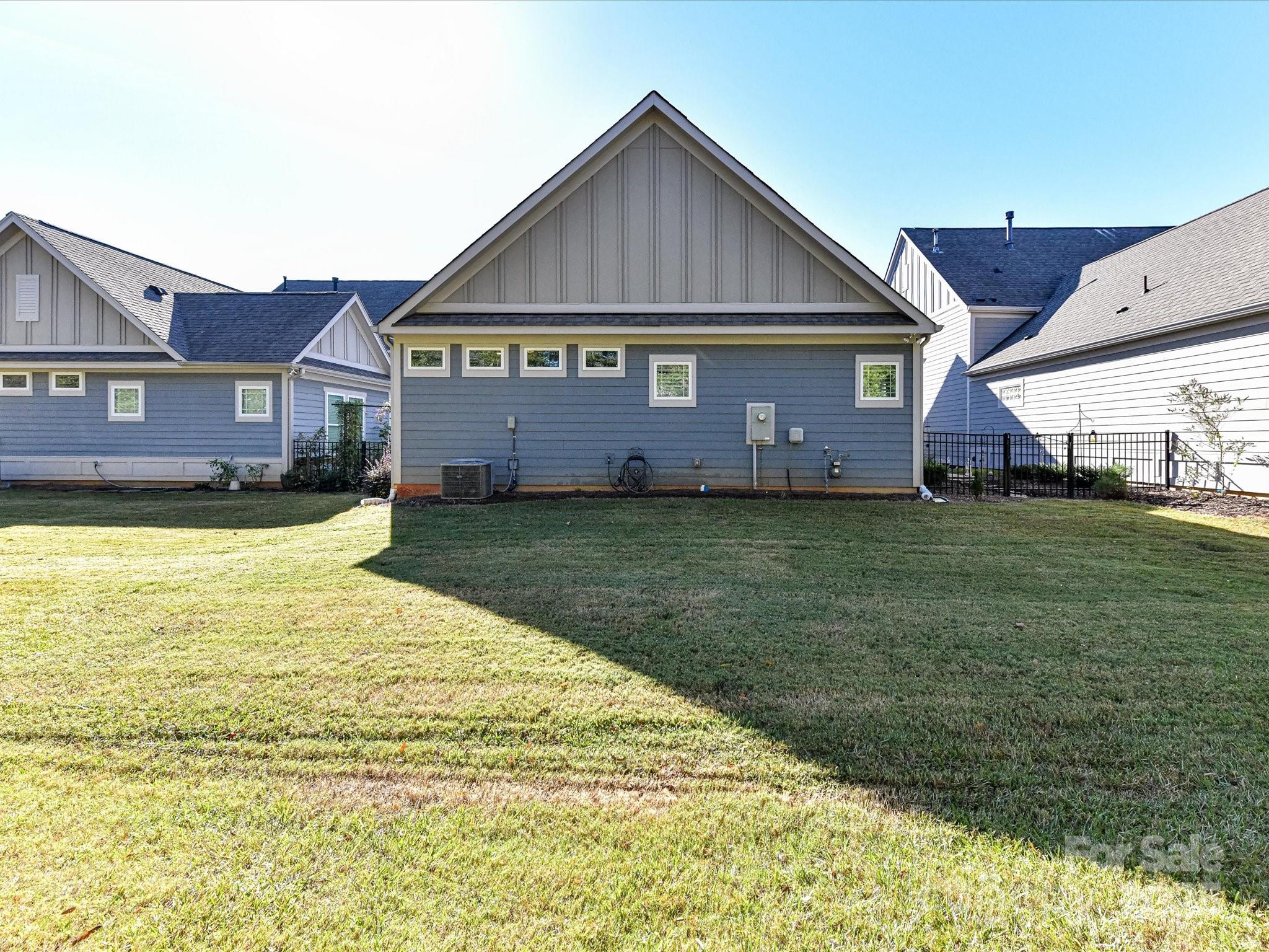 2006 Laney Pond Road Matthews, NC 28104 - Photo 29 of 30 a view of a house with a yard