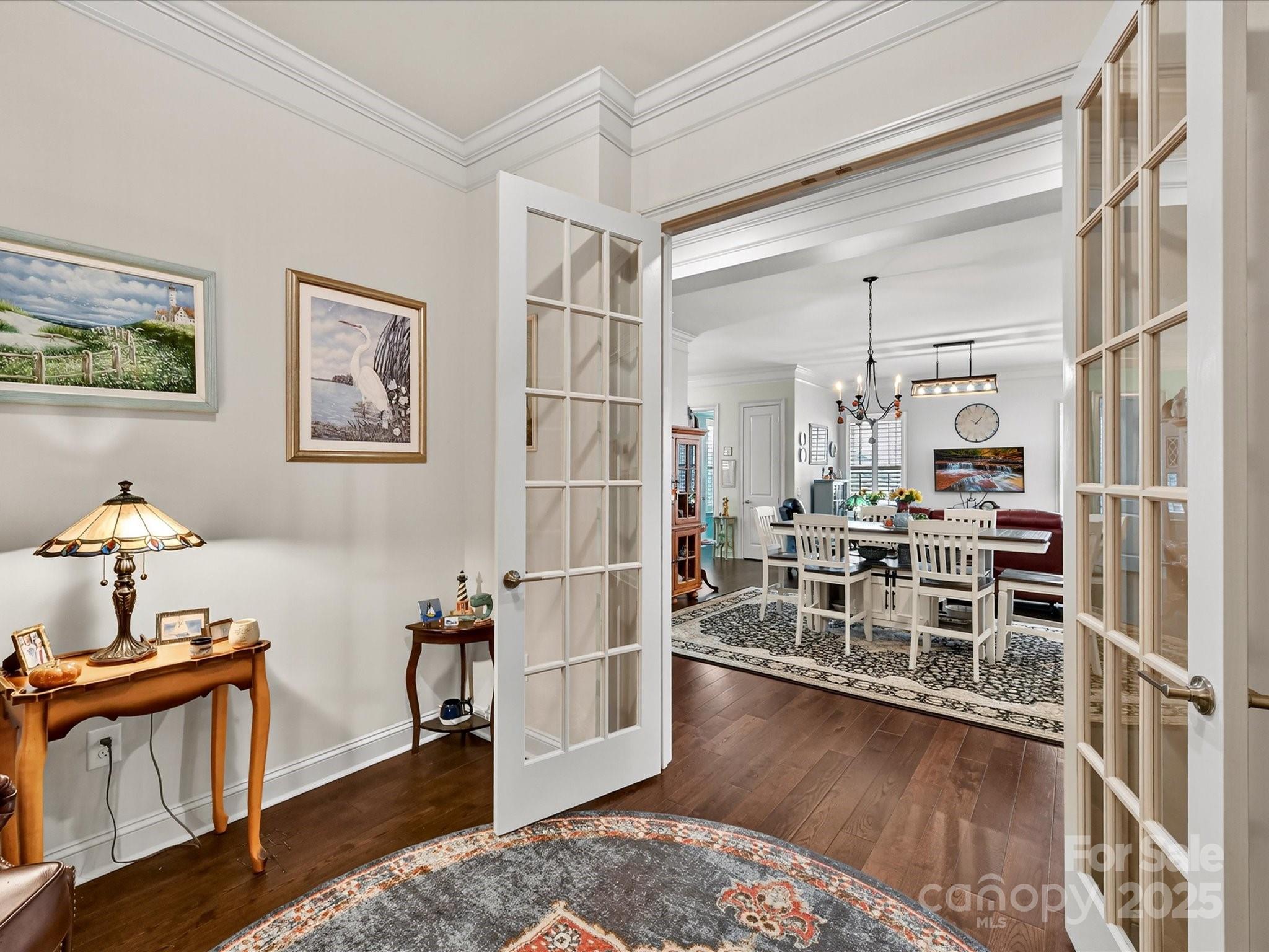 2006 Laney Pond Road Matthews, NC 28104 - Photo 5 of 30 a room with lots of wooden furniture and a window