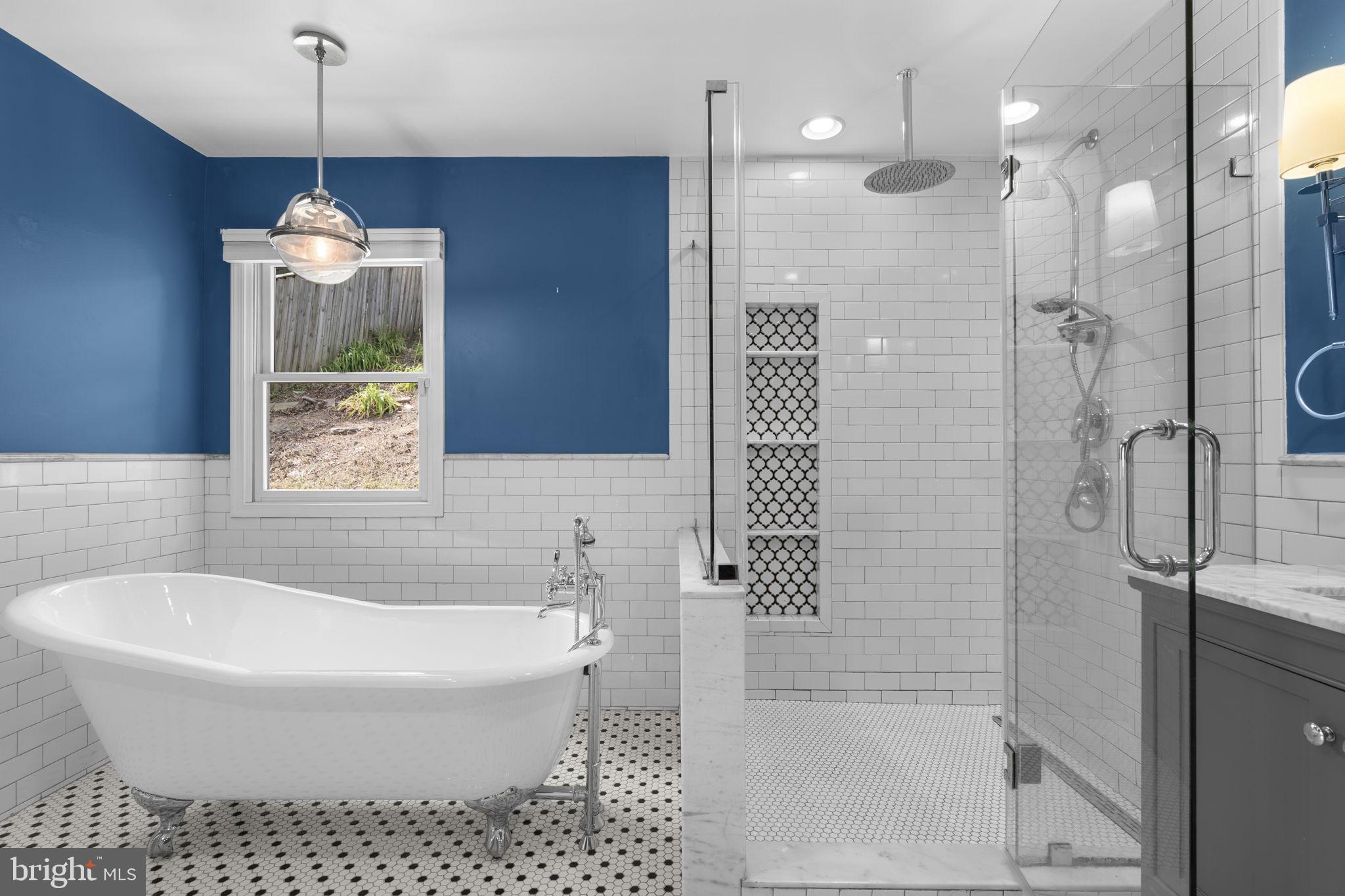 822 Loxford Terrace Silver Spring, MD 20901 - Photo 38 of 61 a bathroom with a bathtub and a shower