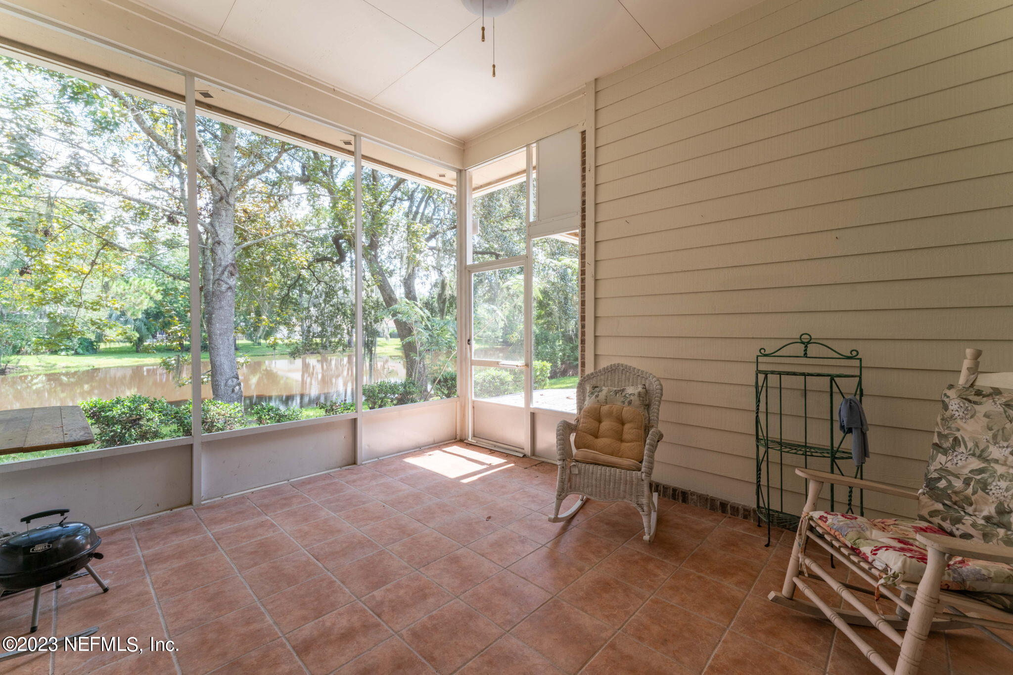 1505 Marsh Rabbit Way Fleming Island, FL 32003 - Photo 29 of 52 Enclosed Lanai 2