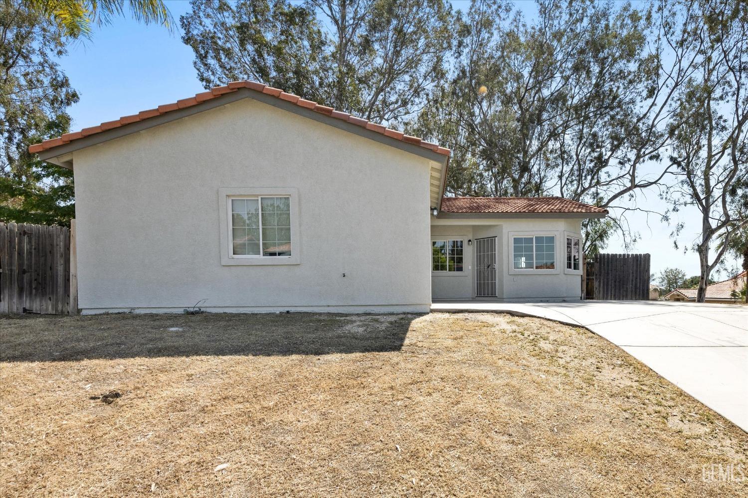 Undisclosed Address Bakersfield, CA 93306 - Photo 2 of 32 a house with a outdoor space