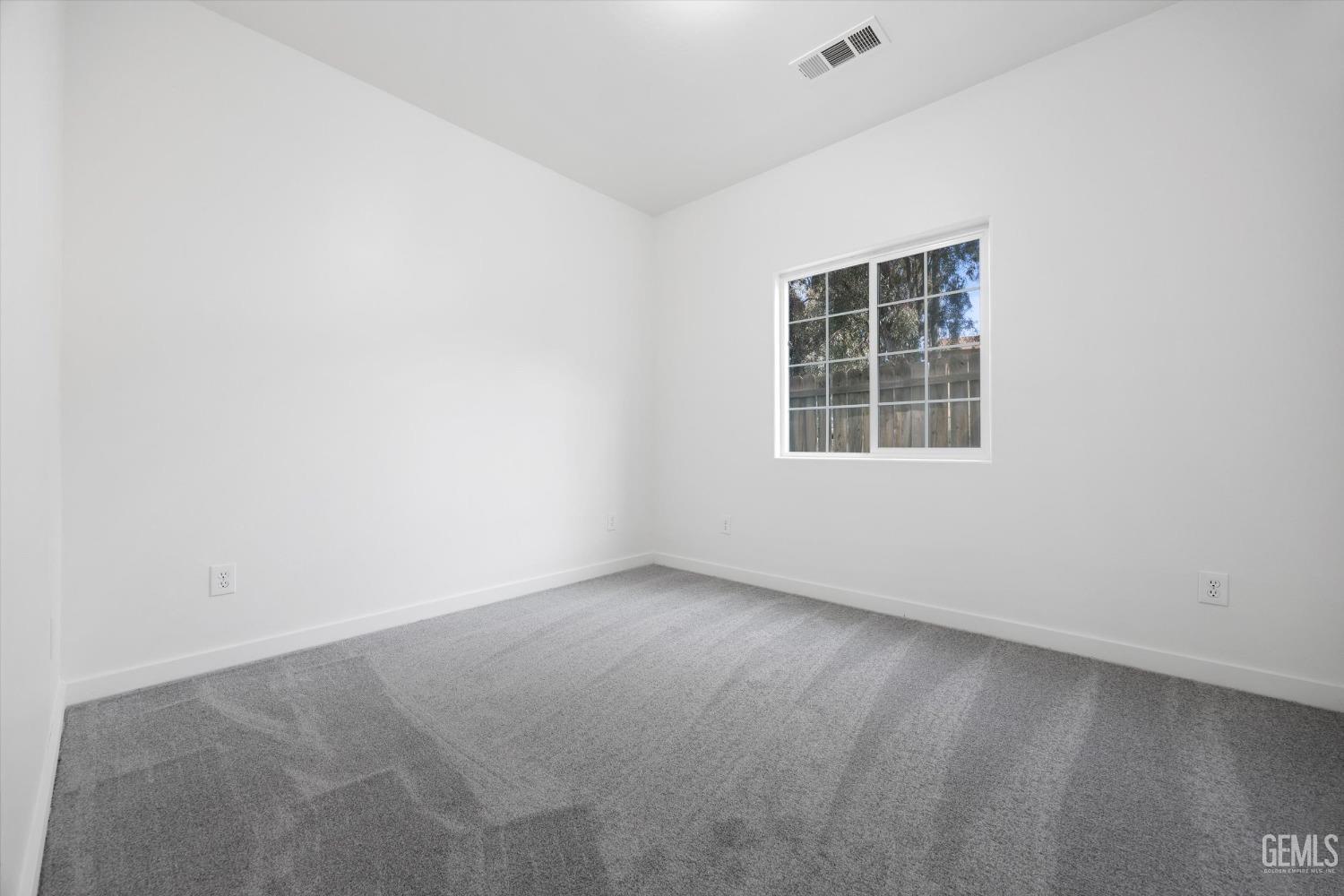 Undisclosed Address Bakersfield, CA 93306 - Photo 25 of 32 an empty room with a window