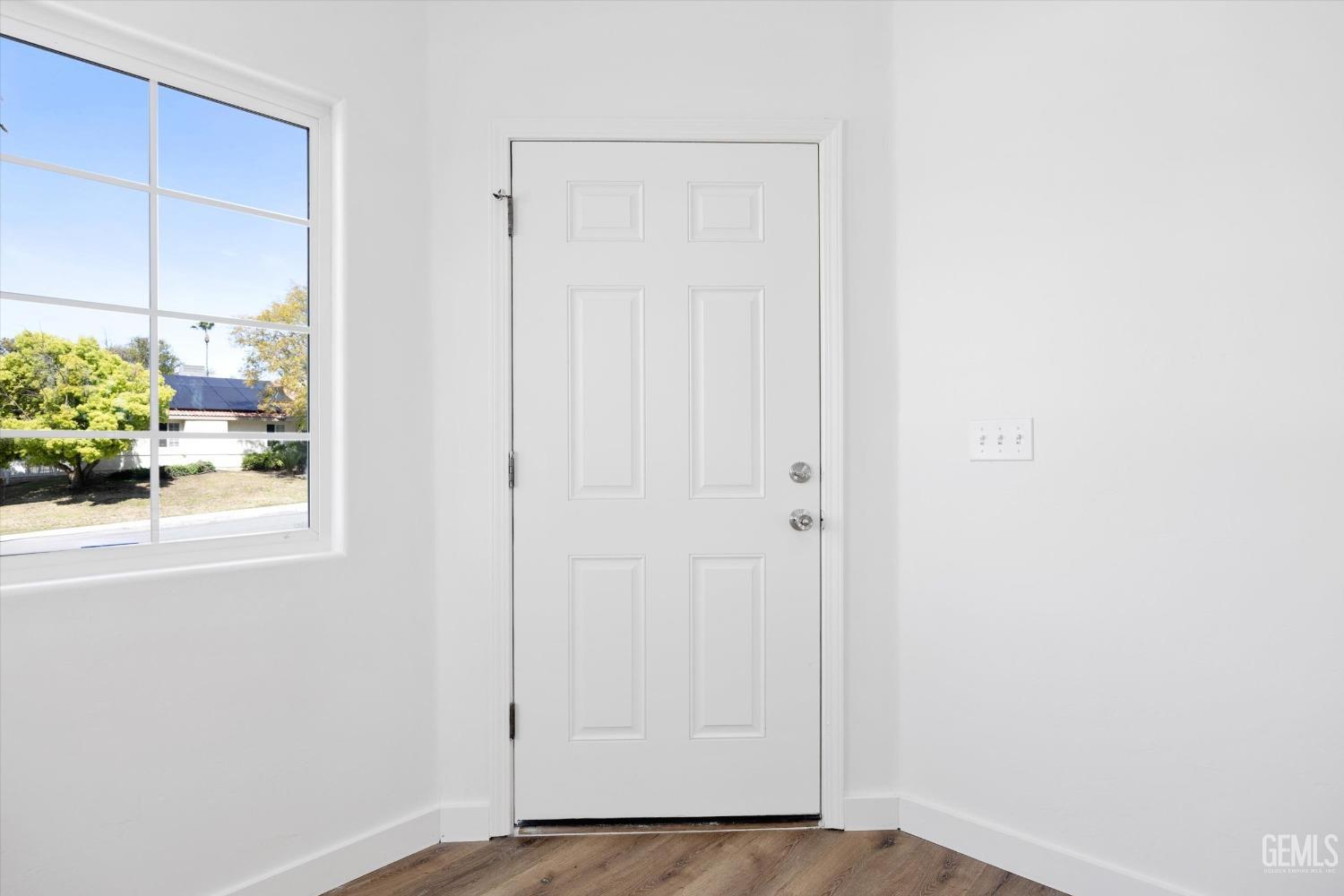 Undisclosed Address Bakersfield, CA 93306 - Photo 6 of 32 a view of a small space with wooden floor