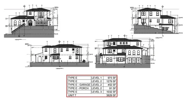 a black and white photo of a living room