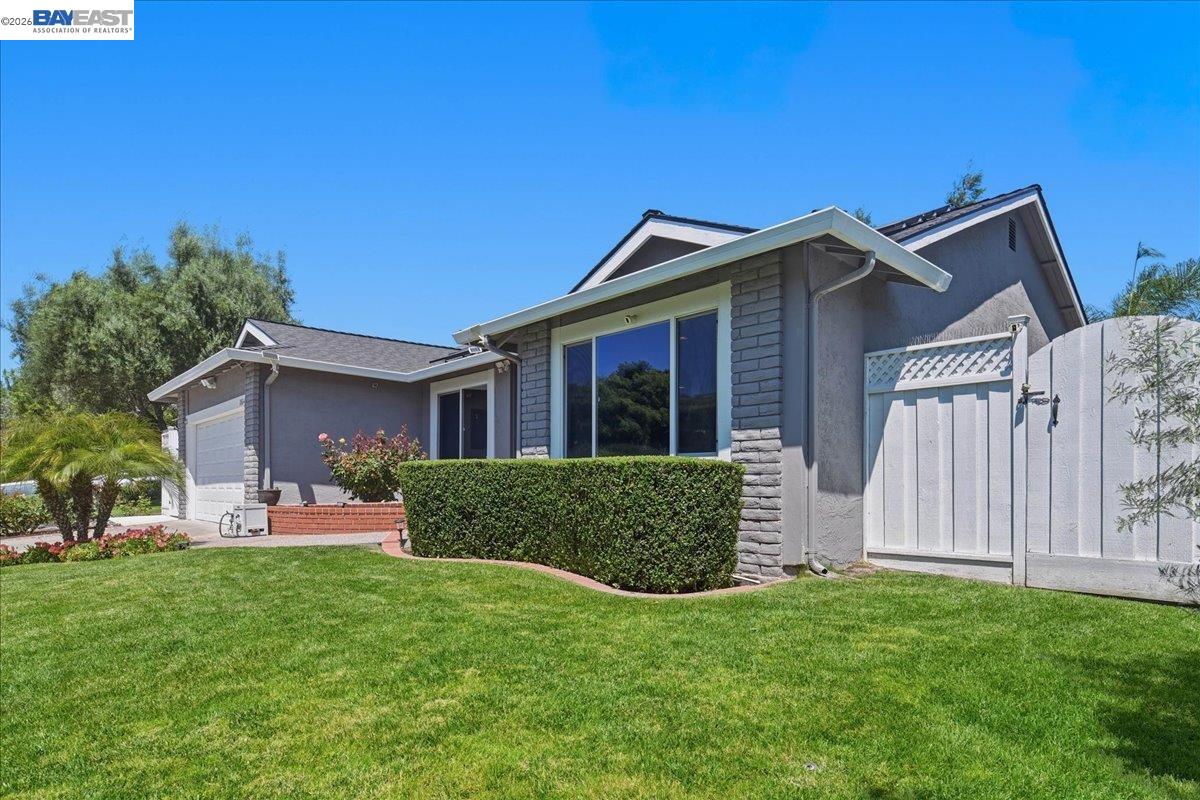 2861 Millbridge Place San Ramon, CA 94583 - Photo 6 of 58 a front view of house with yard and outdoor seating
