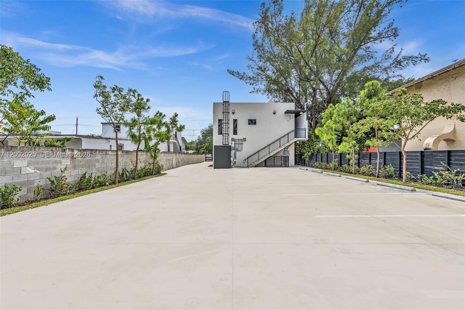 753 Northwest 30th Street, Unit 3 Miami, FL 33127 - Photo 28 of 35 a view of a backyard of a house
