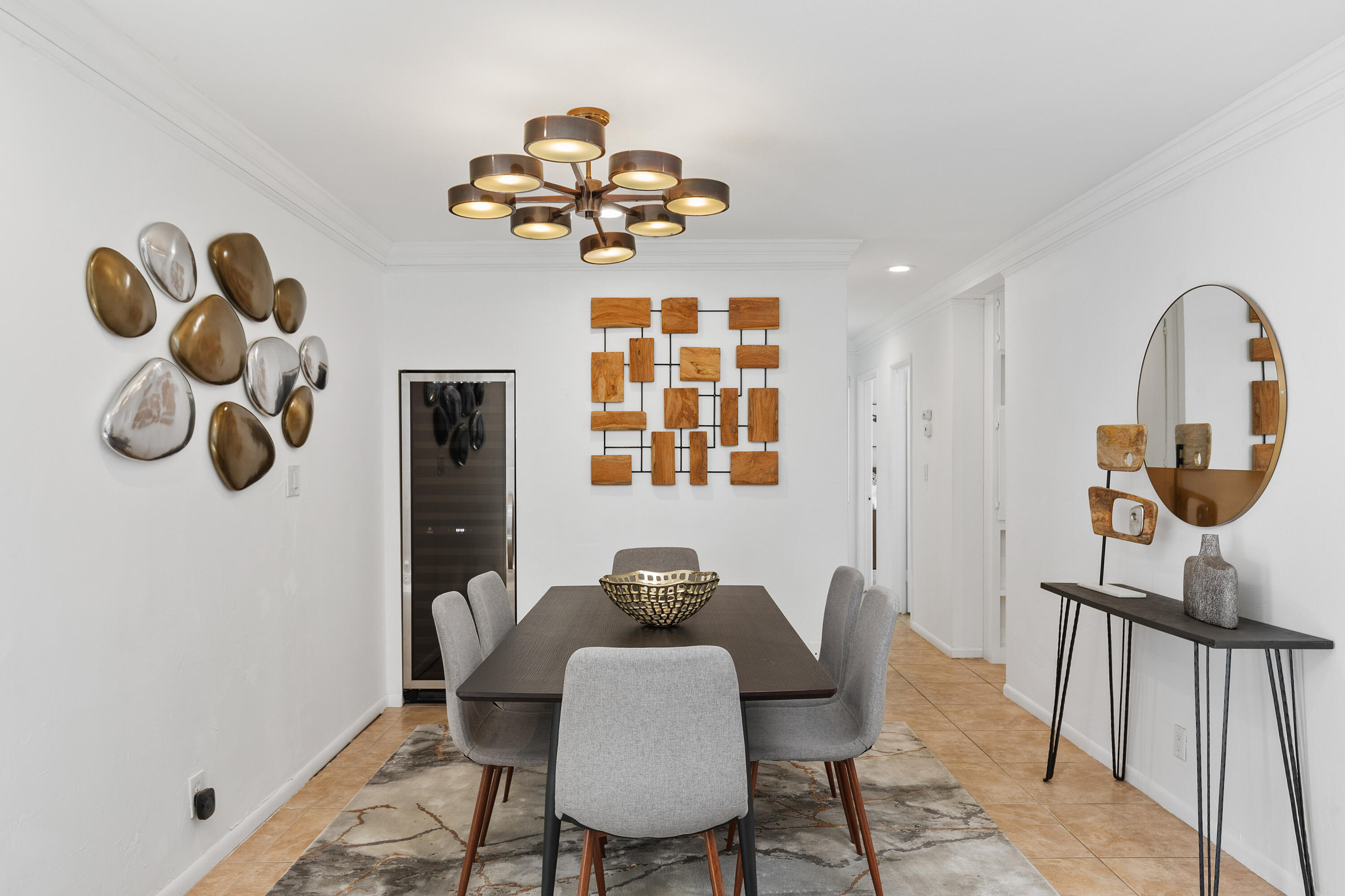 70050 Chappel Road Rancho Mirage, CA 92270 - Photo 11 of 36 a dining room with furniture a chandelier and window