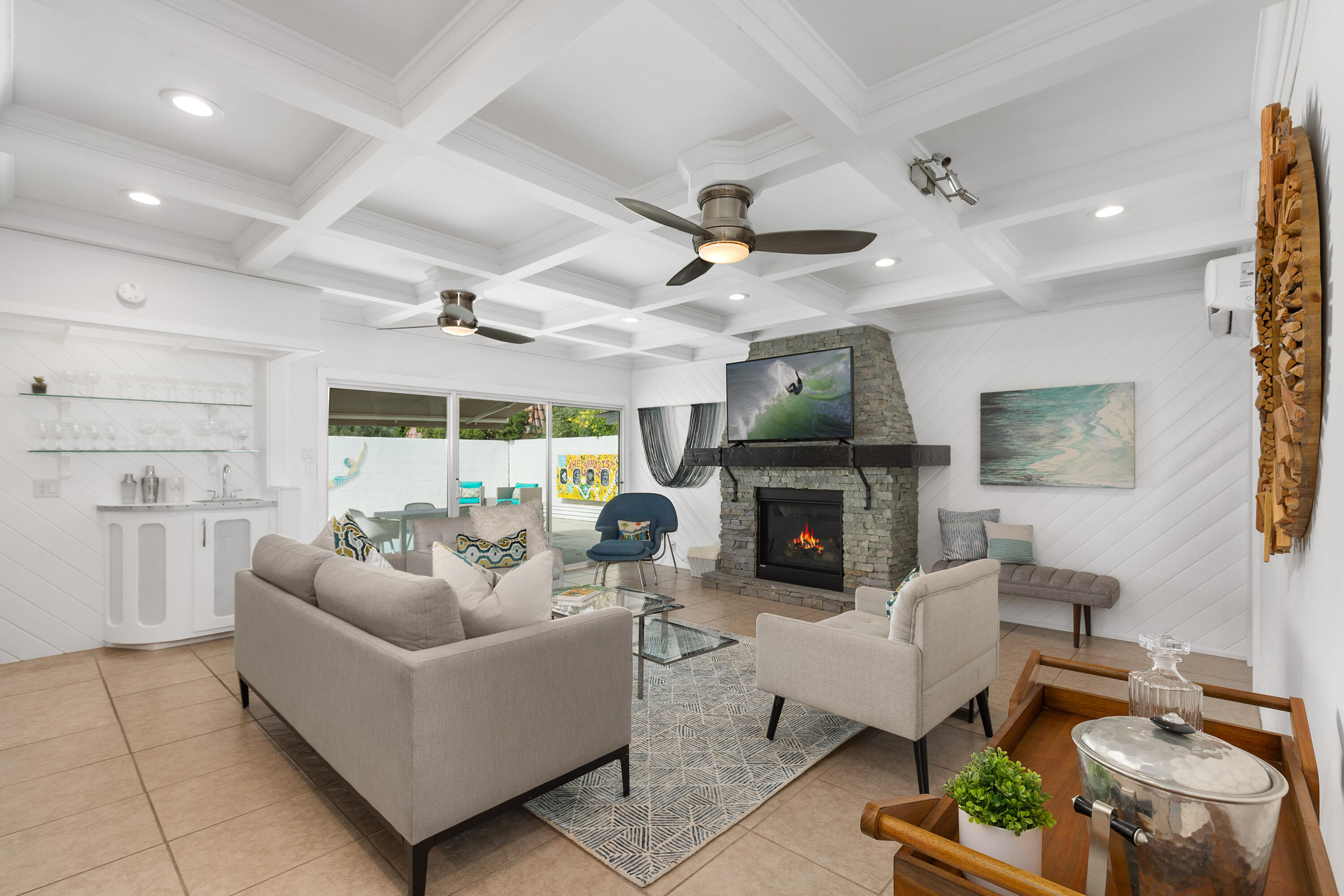 70050 Chappel Road Rancho Mirage, CA 92270 - Photo 14 of 36 a living room with furniture fireplace and a large window