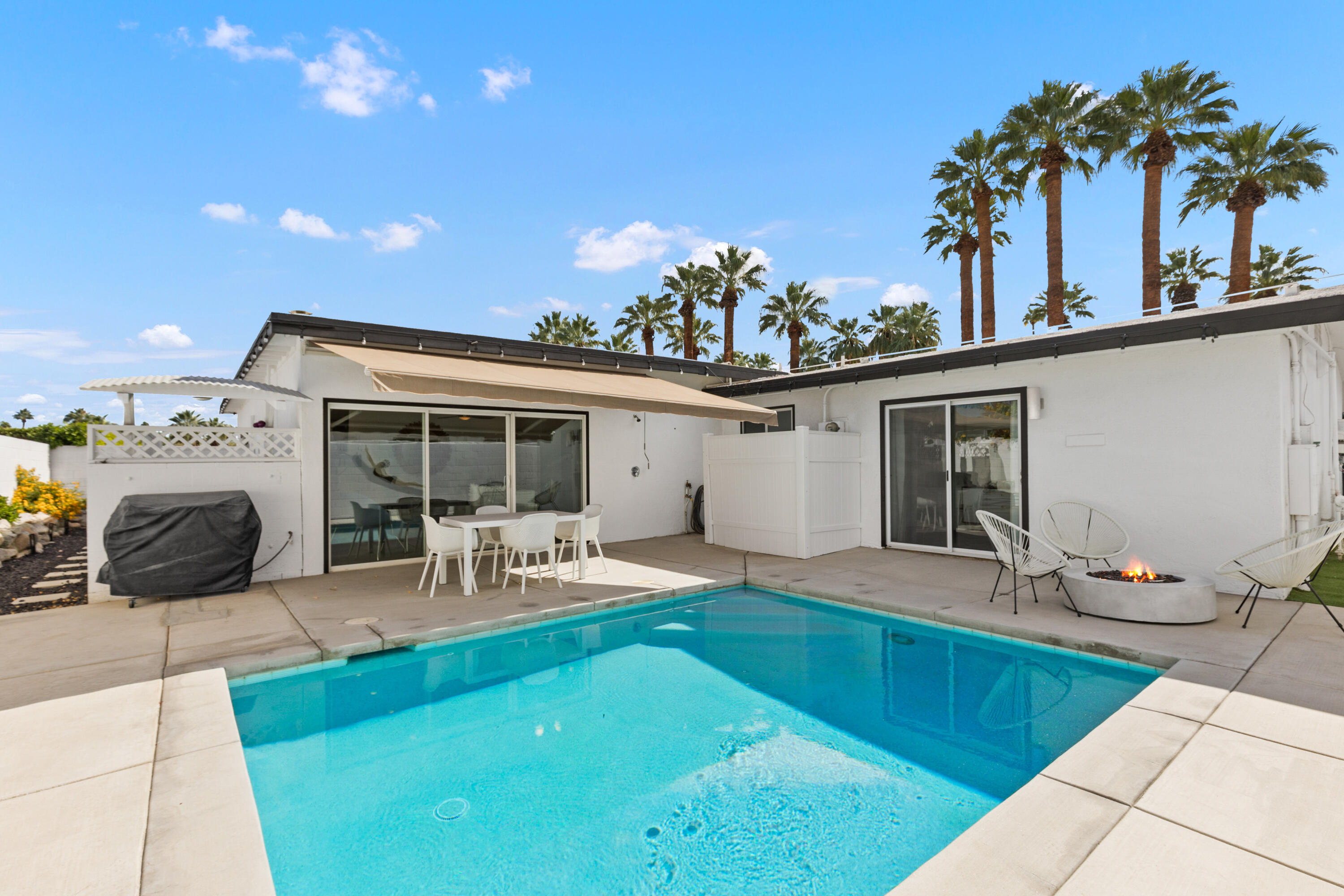 70050 Chappel Road Rancho Mirage, CA 92270 - Photo 30 of 36 a view of a backyard with plants and patio