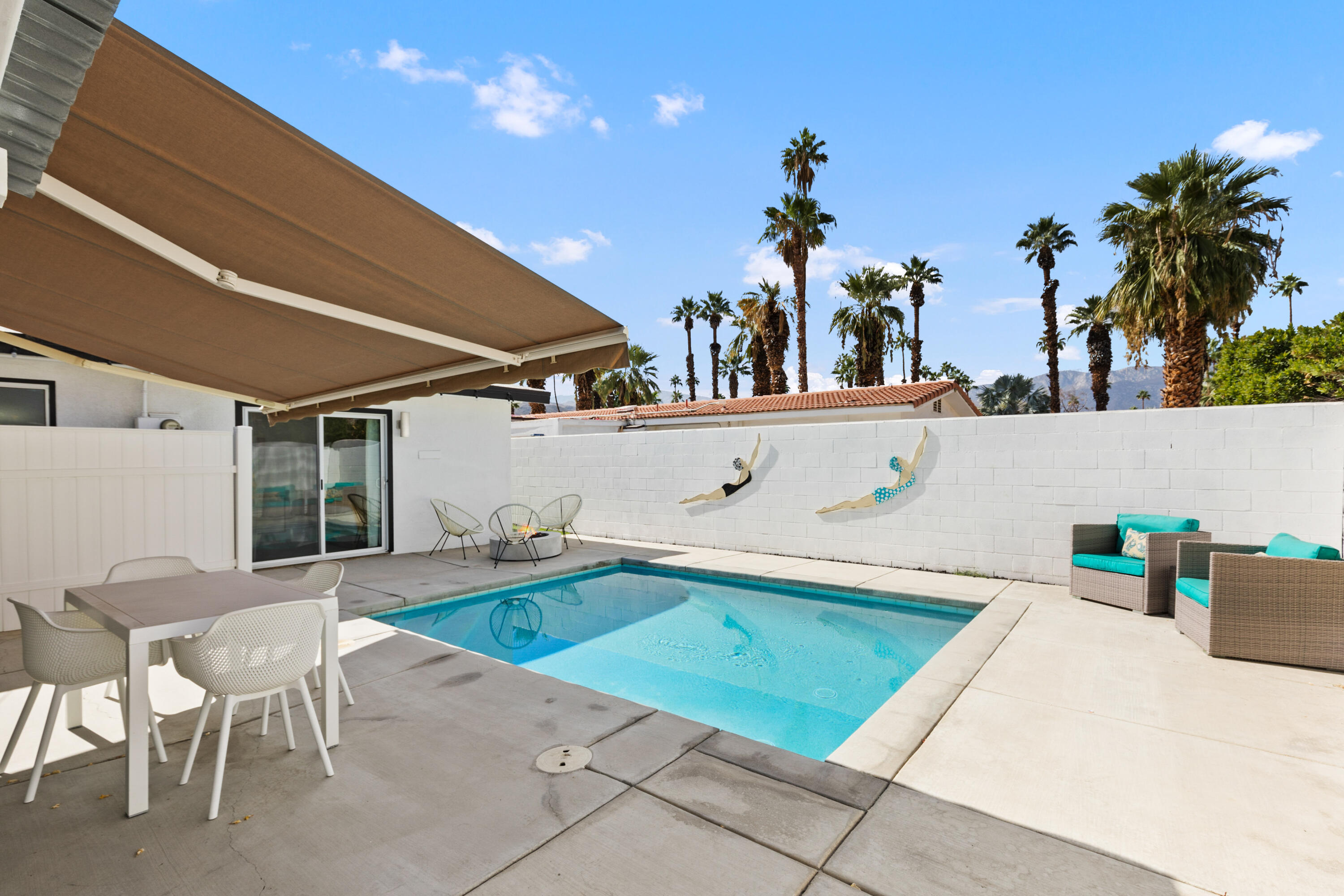 70050 Chappel Road Rancho Mirage, CA 92270 - Photo 31 of 36 a outdoor space with swimming pool and furniture